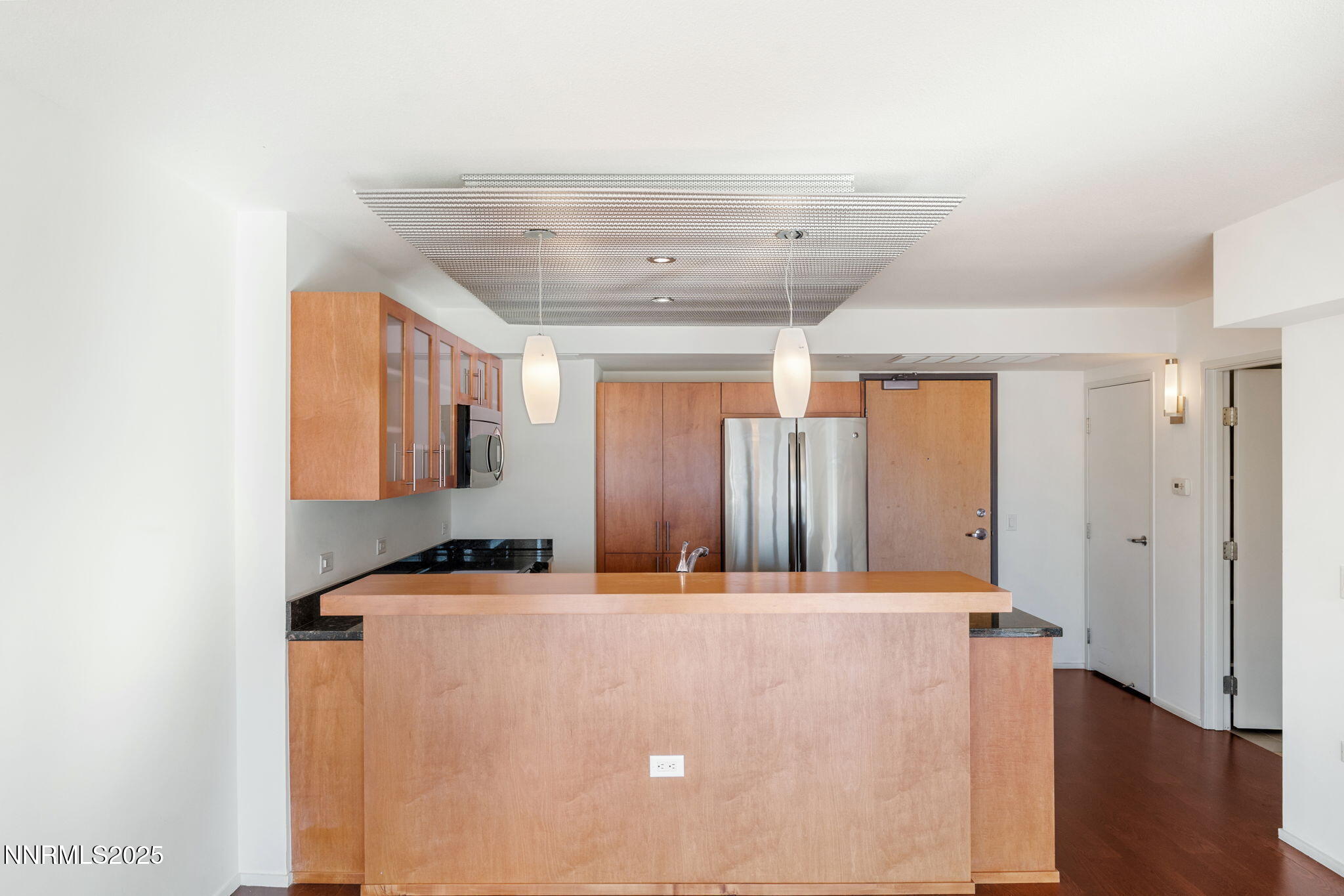 255 North Sierra Street, Unit 1012 Reno, NV 89501 - Photo 9 of 32 a view of a room with wooden floor