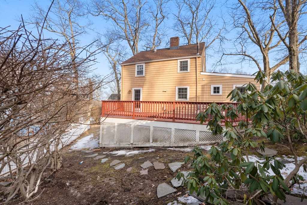 73 Roundwood Road Newton, MA 02464 - Photo 29 of 42 a view of a house with a yard