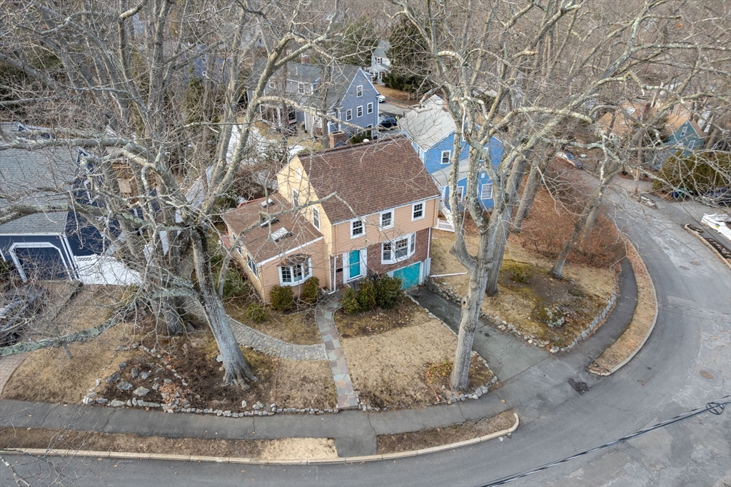 73 Roundwood Road Newton, MA 02464 - Photo 33 of 42 a view of a house with a yard