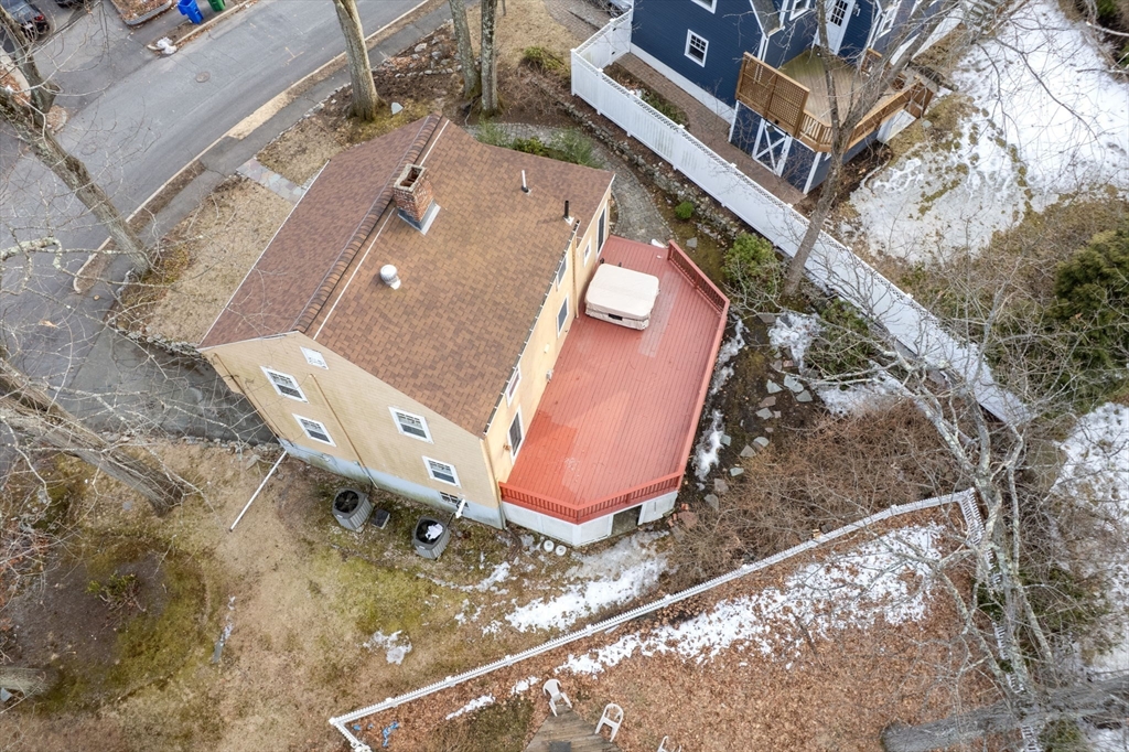 73 Roundwood Road Newton, MA 02464 - Photo 38 of 42 an aerial view of a house with a yard
