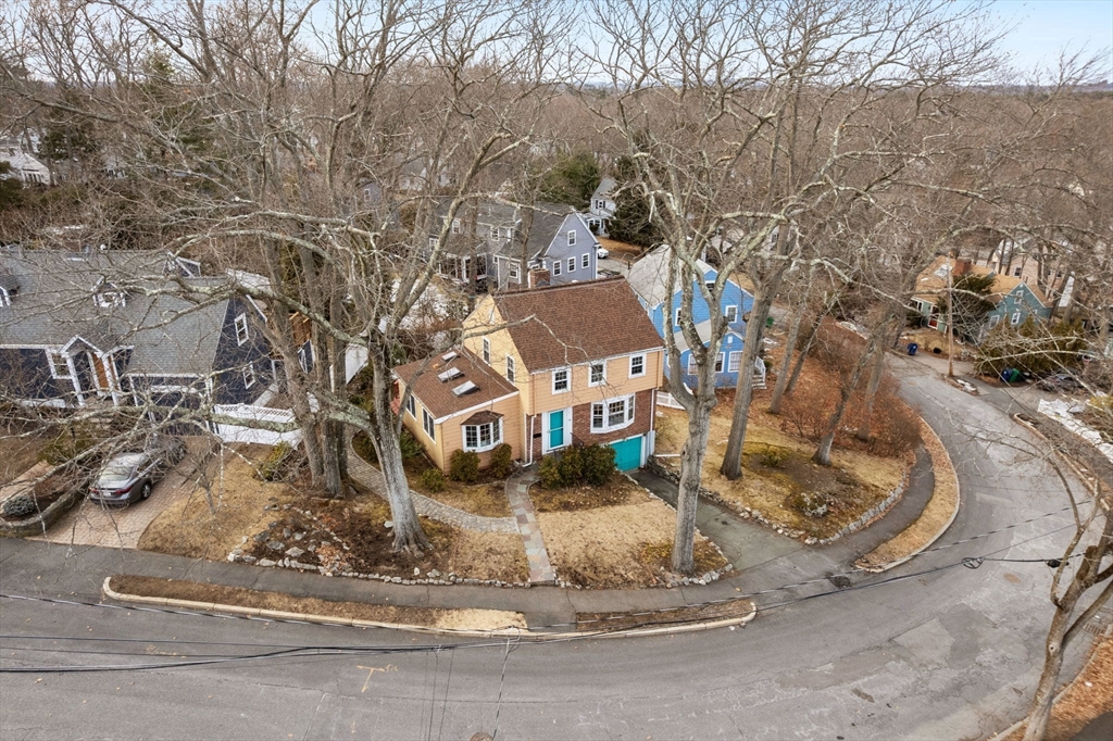73 Roundwood Road Newton, MA 02464 - Photo 41 of 42 a view of a house with a yard