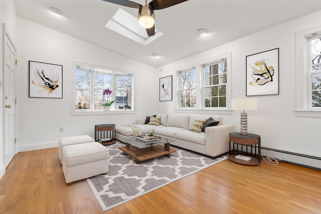 73 Roundwood Road Newton, MA 02464 - Photo 5 of 42 a living room with furniture or couch and a wooden floor