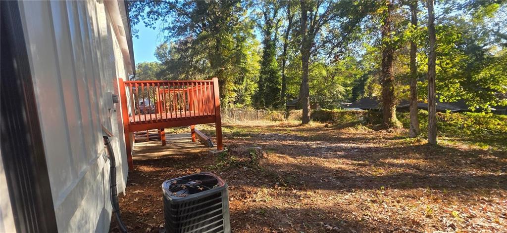 4834 Bartlett Road Forest Park, GA 30297 - Photo 17 of 20 a view of a wooden street from a window