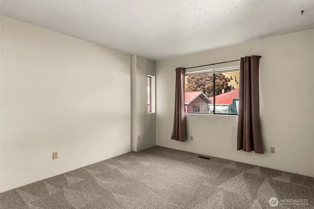 a view of a hallway with closet