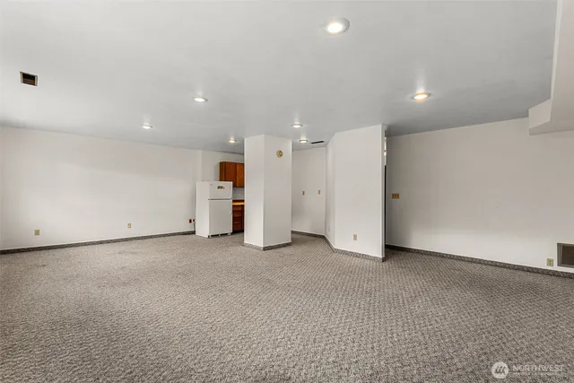 a utility room with cabinets