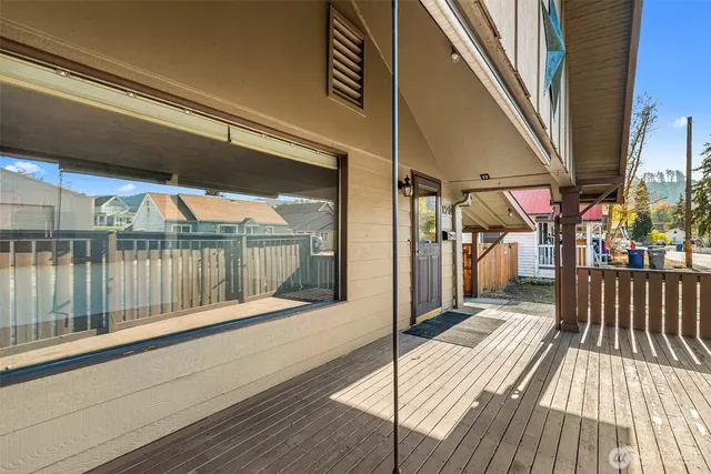 a balcony view with a outdoor seating