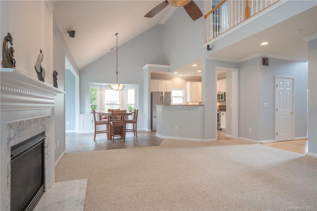 307 Prestmont Court Fort Mill, SC 29708 - Photo 14 of 38 a view of a livingroom with furniture and a fireplace