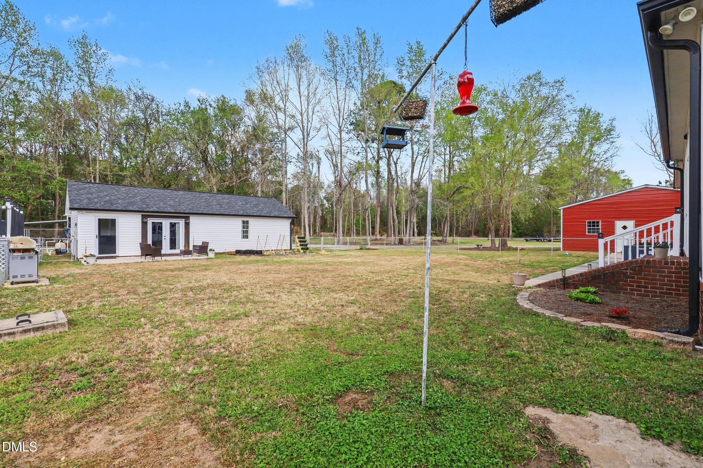 430 Fred Hall Road Stedman, NC 28391 - Photo 29 of 63 a house view with a garden space