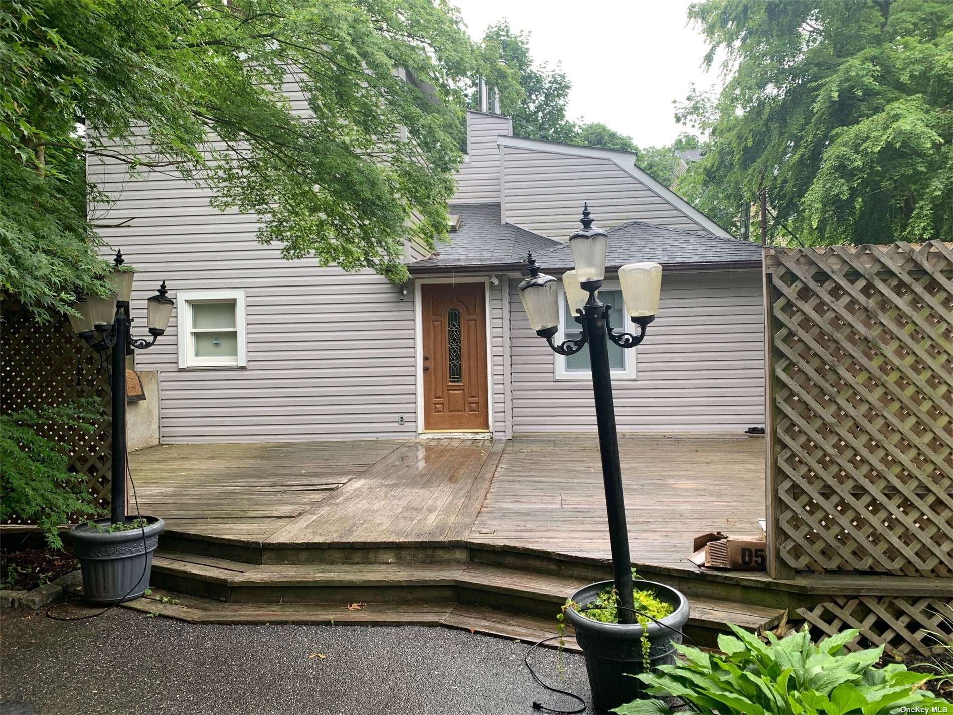 a front view of a house with porch