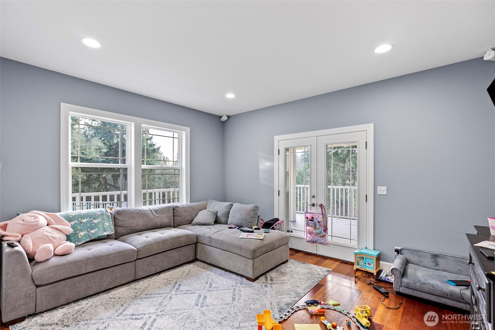 2300 Northeast Solar View Court Poulsbo, WA 98370 - Photo 11 of 28 a living room with furniture and a window