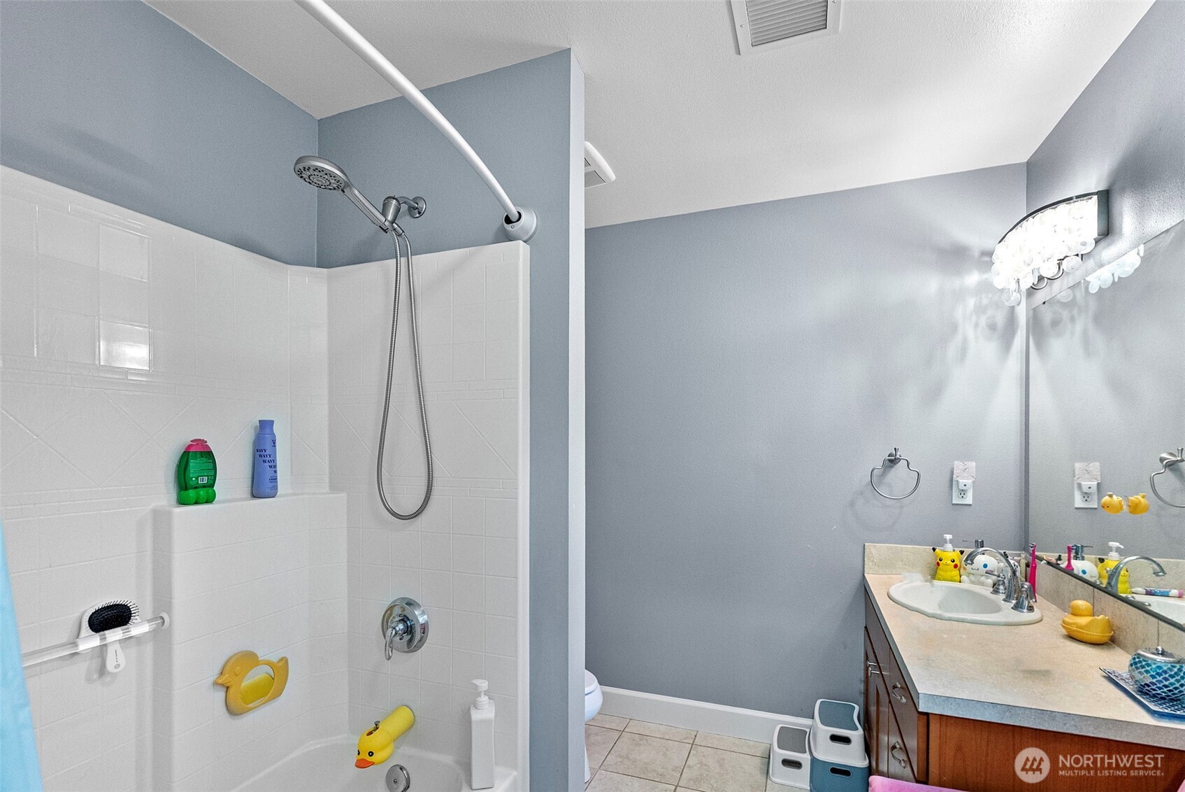 2300 Northeast Solar View Court Poulsbo, WA 98370 - Photo 14 of 28 a bathroom with a sink mirror and vanity