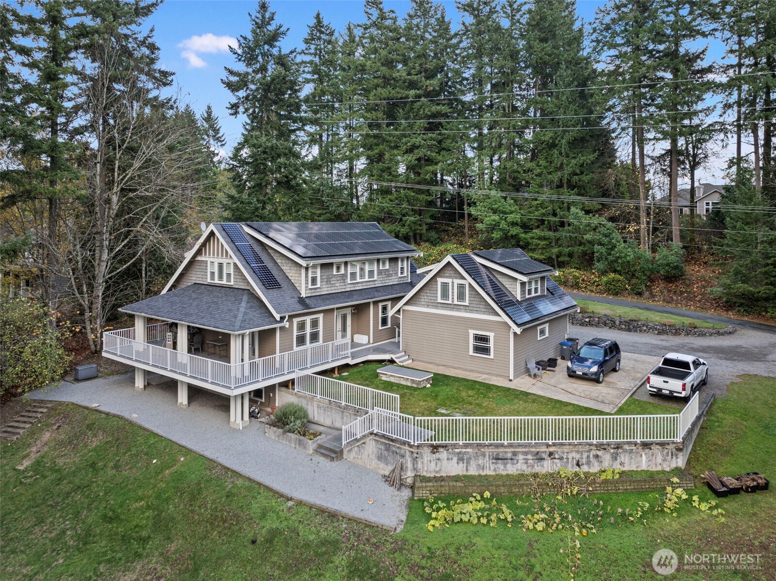 2300 Northeast Solar View Court Poulsbo, WA 98370 - Photo 3 of 28 an aerial view of a house with swimming pool and deck
