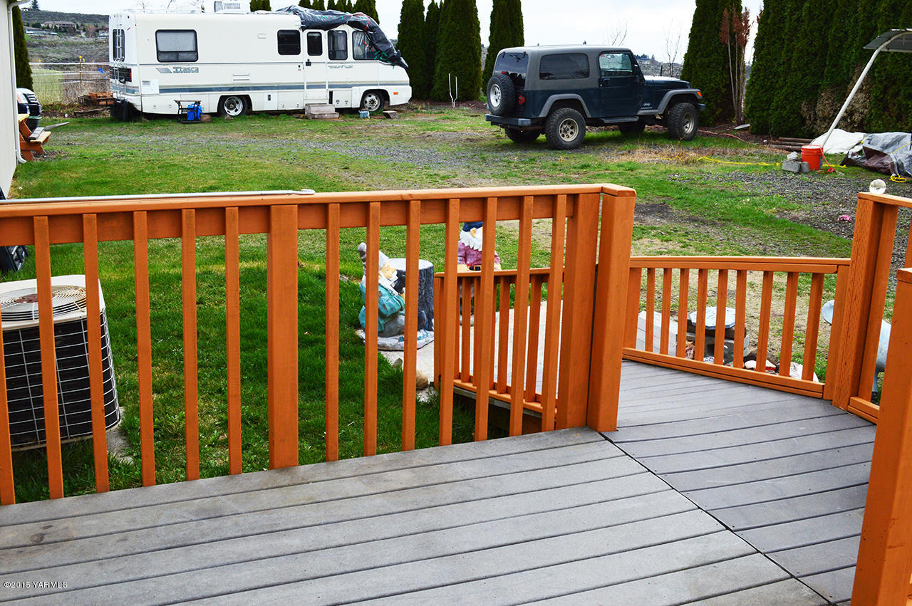 16695 Summitview Road Cowiche, WA 98923 - Photo 14 of 20 a view of a deck with a garden