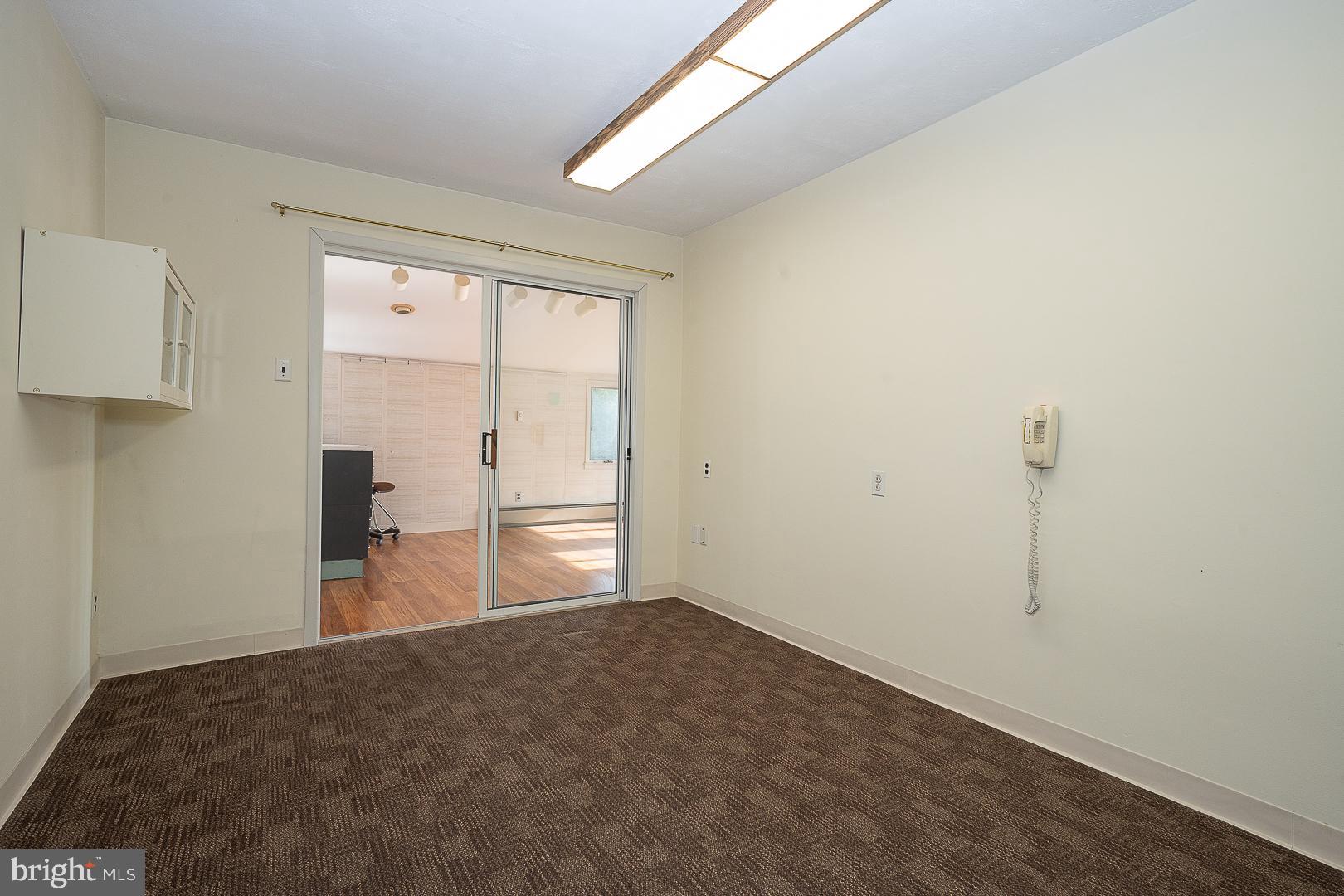 11 Tenby Road Havertown, PA 19083 - Photo 27 of 62 a view of empty room with wooden floor and fan