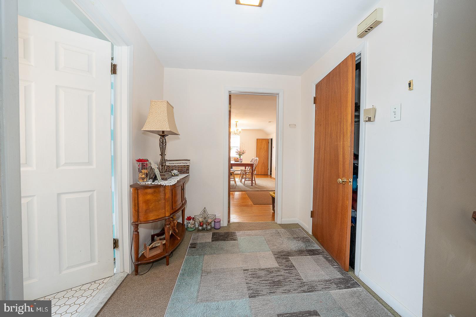 11 Tenby Road Havertown, PA 19083 - Photo 37 of 62 a view of a hallway with bathroom and mirror