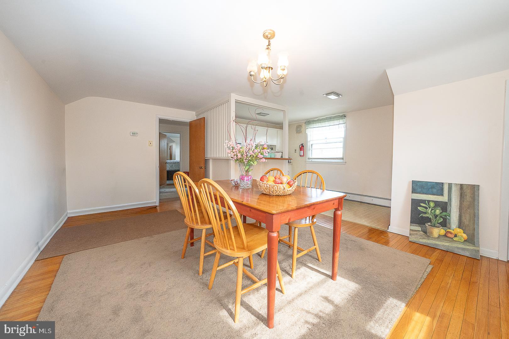 11 Tenby Road Havertown, PA 19083 - Photo 40 of 62 a view of a dining room with furniture and wooden floor