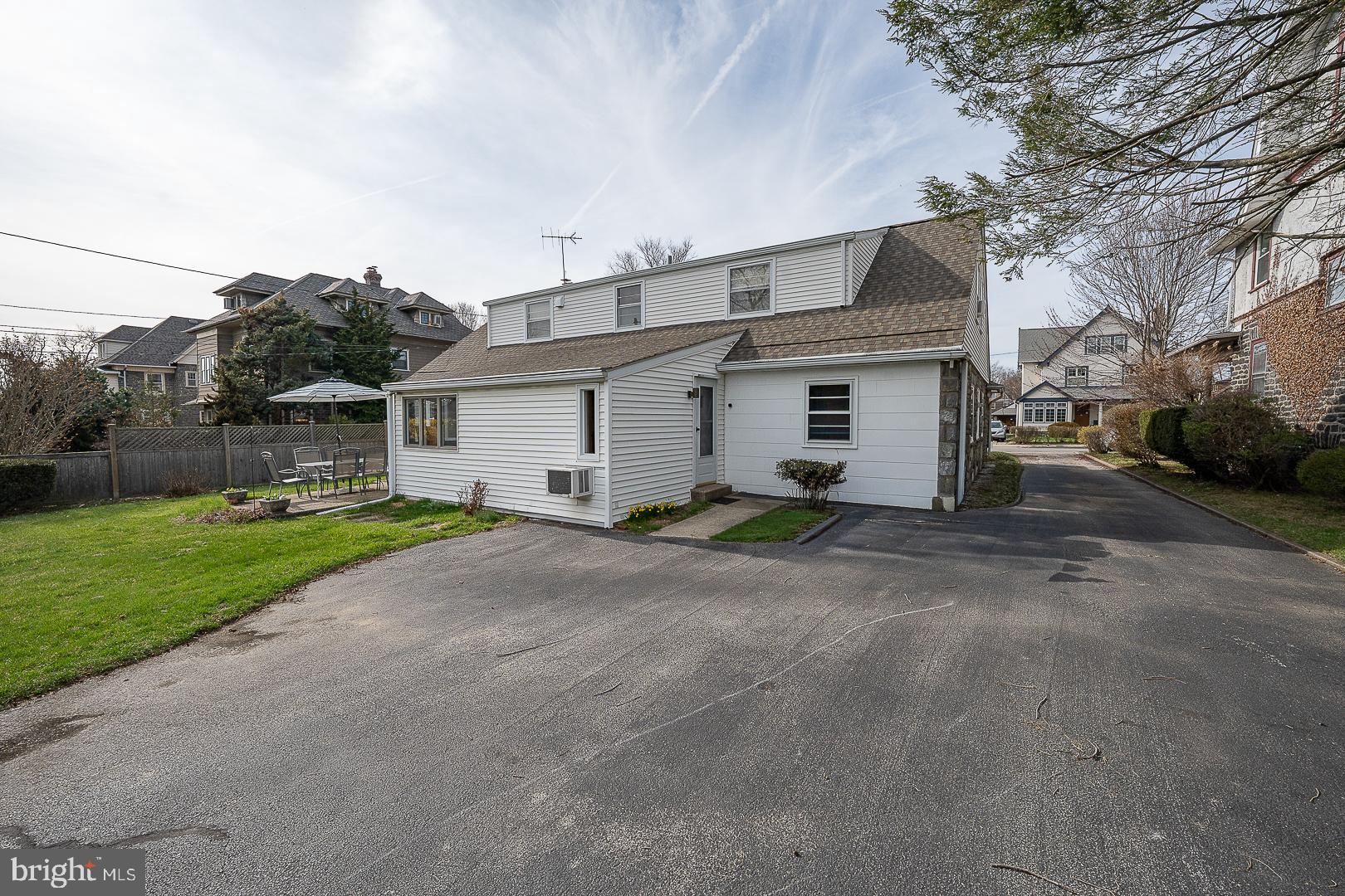 11 Tenby Road Havertown, PA 19083 - Photo 47 of 62 a front view of a house with a yard and garage