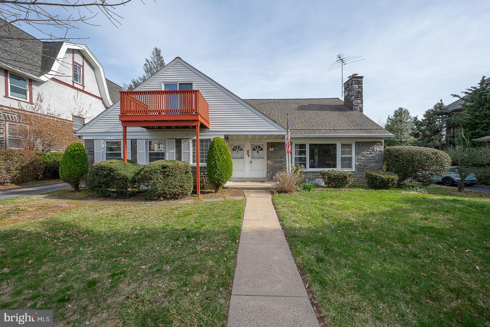 11 Tenby Road Havertown, PA 19083 - Photo 5 of 62 a front view of a house with a yard and potted plants