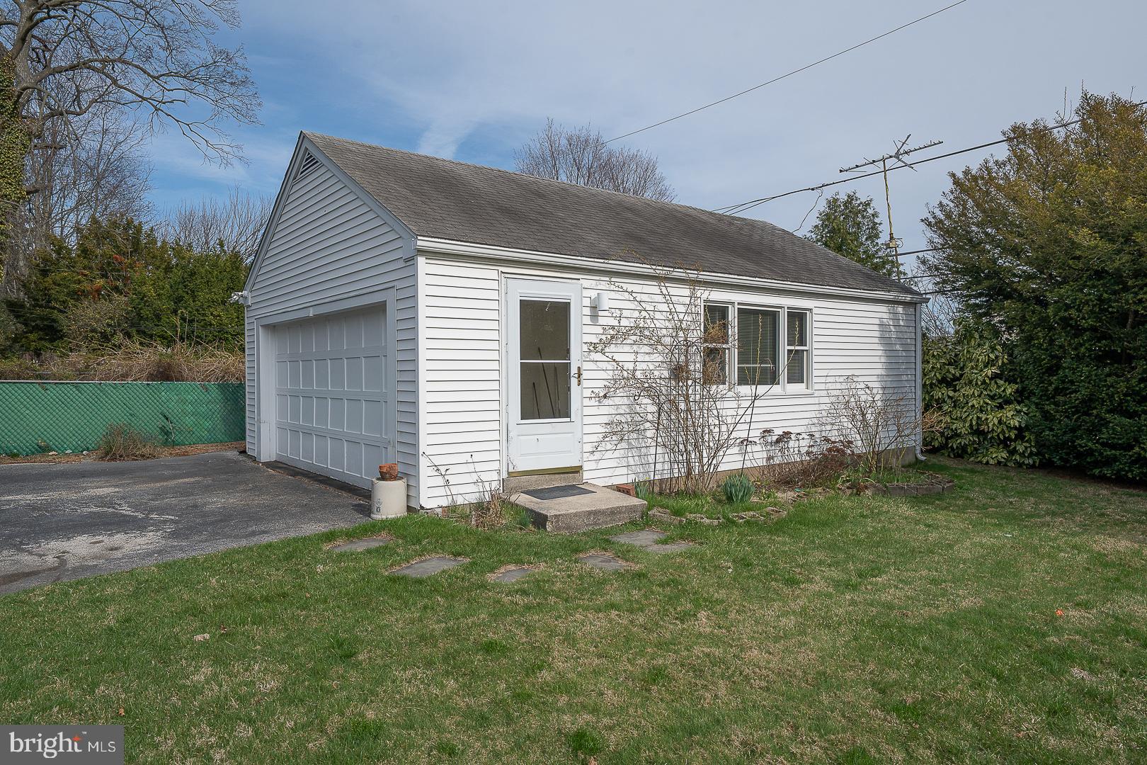 11 Tenby Road Havertown, PA 19083 - Photo 52 of 62 a front view of house with yard and green space