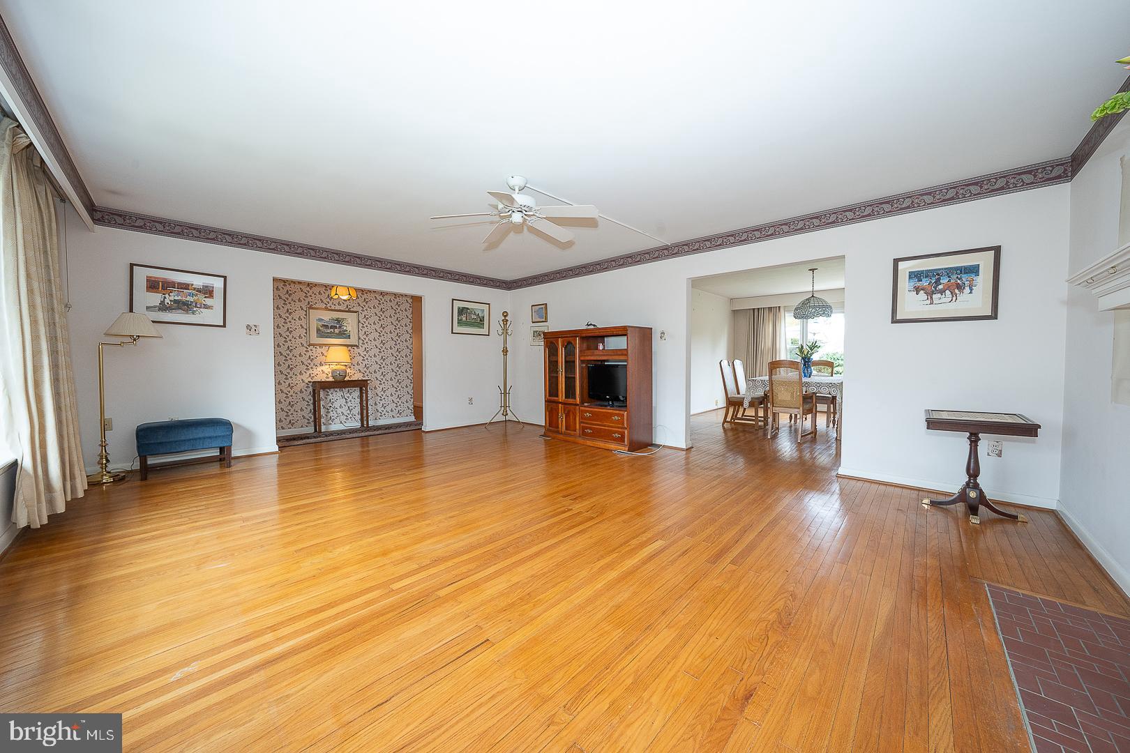 11 Tenby Road Havertown, PA 19083 - Photo 8 of 62 a view of empty room with wooden floor and fan