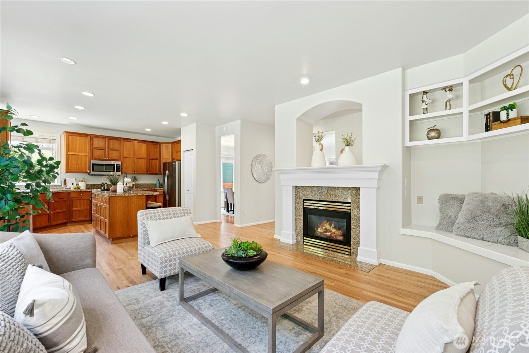 3303 174th Place Southeast Bothell, WA 98012 - Photo 11 of 32 a living room with furniture and a fireplace