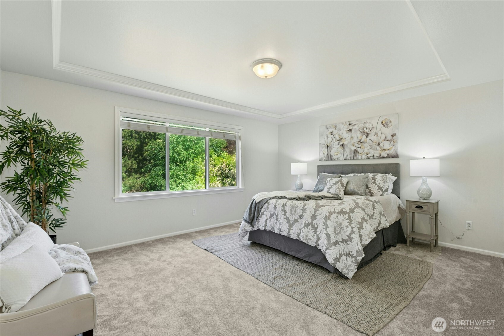 3303 174th Place Southeast Bothell, WA 98012 - Photo 18 of 32 a bedroom with a large bed and a window with outer view