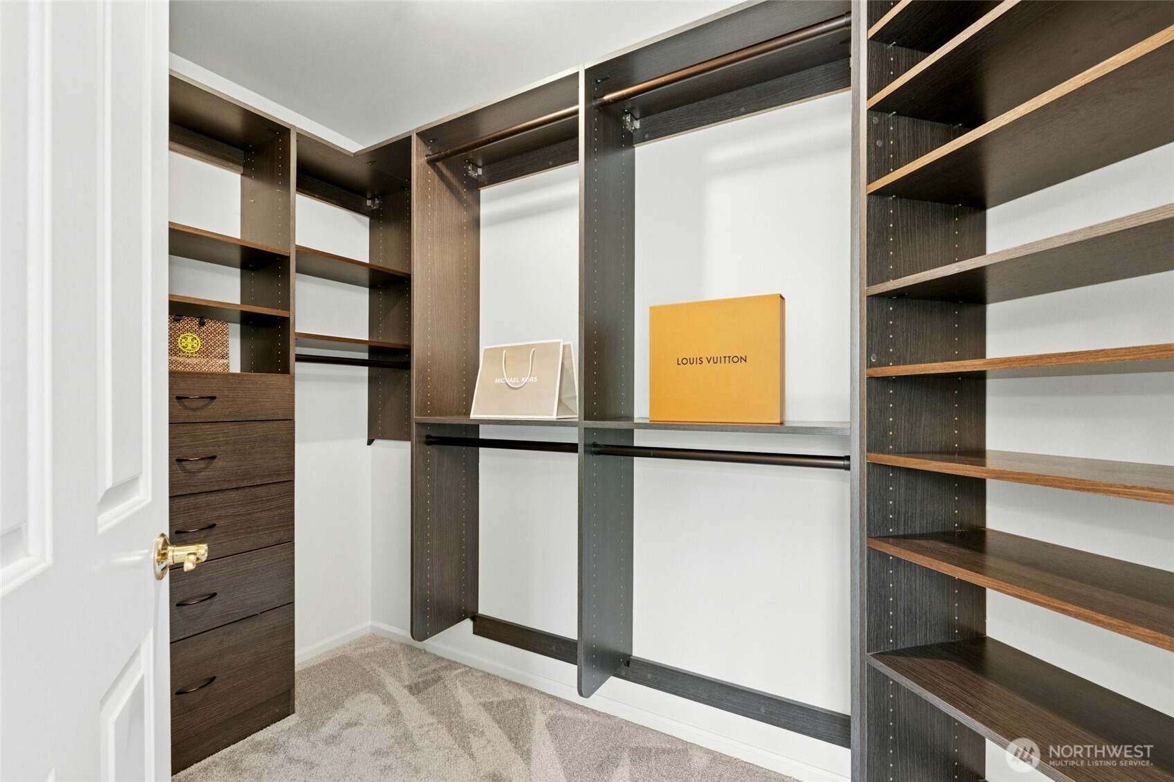 3303 174th Place Southeast Bothell, WA 98012 - Photo 22 of 32 a view of walk in closet with empty racks