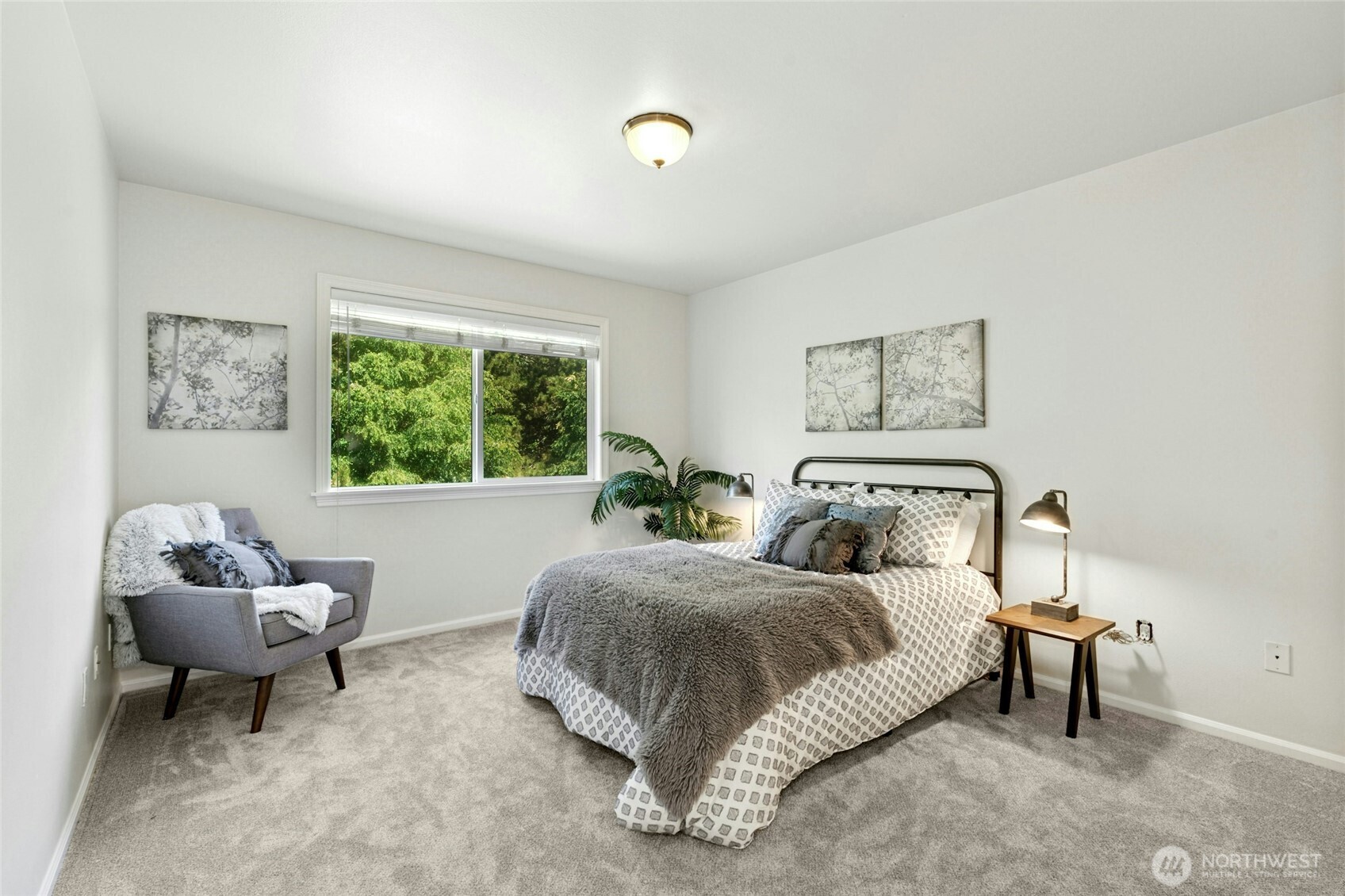3303 174th Place Southeast Bothell, WA 98012 - Photo 23 of 32 a spacious bedroom with a bed and a window