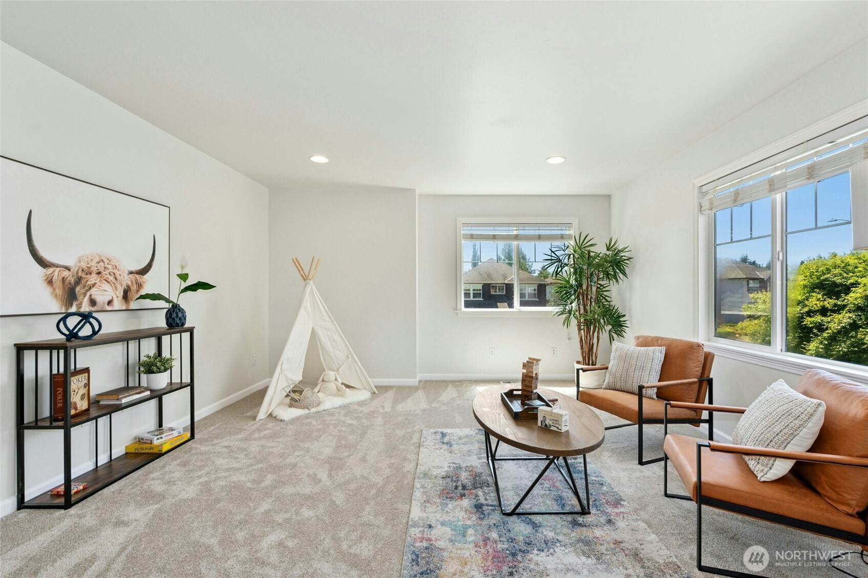 3303 174th Place Southeast Bothell, WA 98012 - Photo 26 of 32 a living room with furniture a rug and a wooden floor