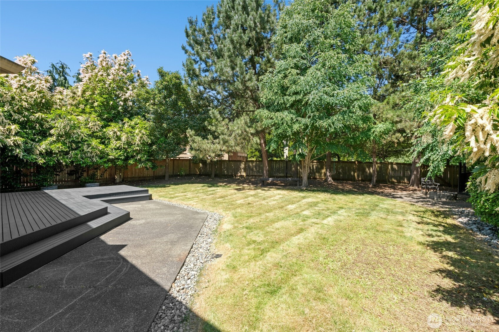 3303 174th Place Southeast Bothell, WA 98012 - Photo 30 of 32 a view of yard with swimming pool and seating area
