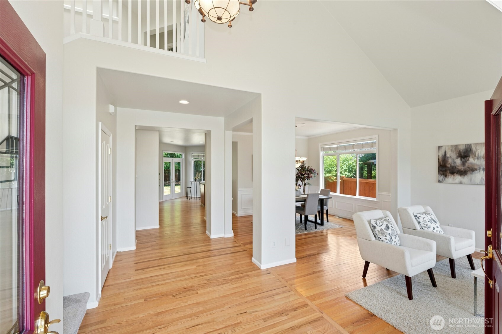 3303 174th Place Southeast Bothell, WA 98012 - Photo 3 of 32 a living room with furniture and wooden floor