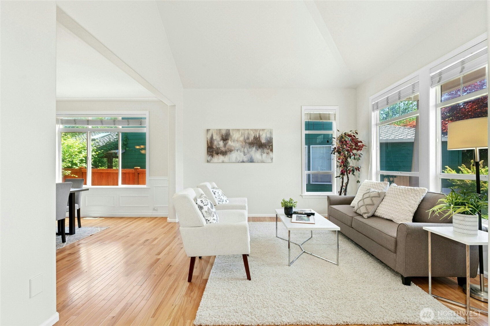 3303 174th Place Southeast Bothell, WA 98012 - Photo 5 of 32 a living room with furniture and a large window