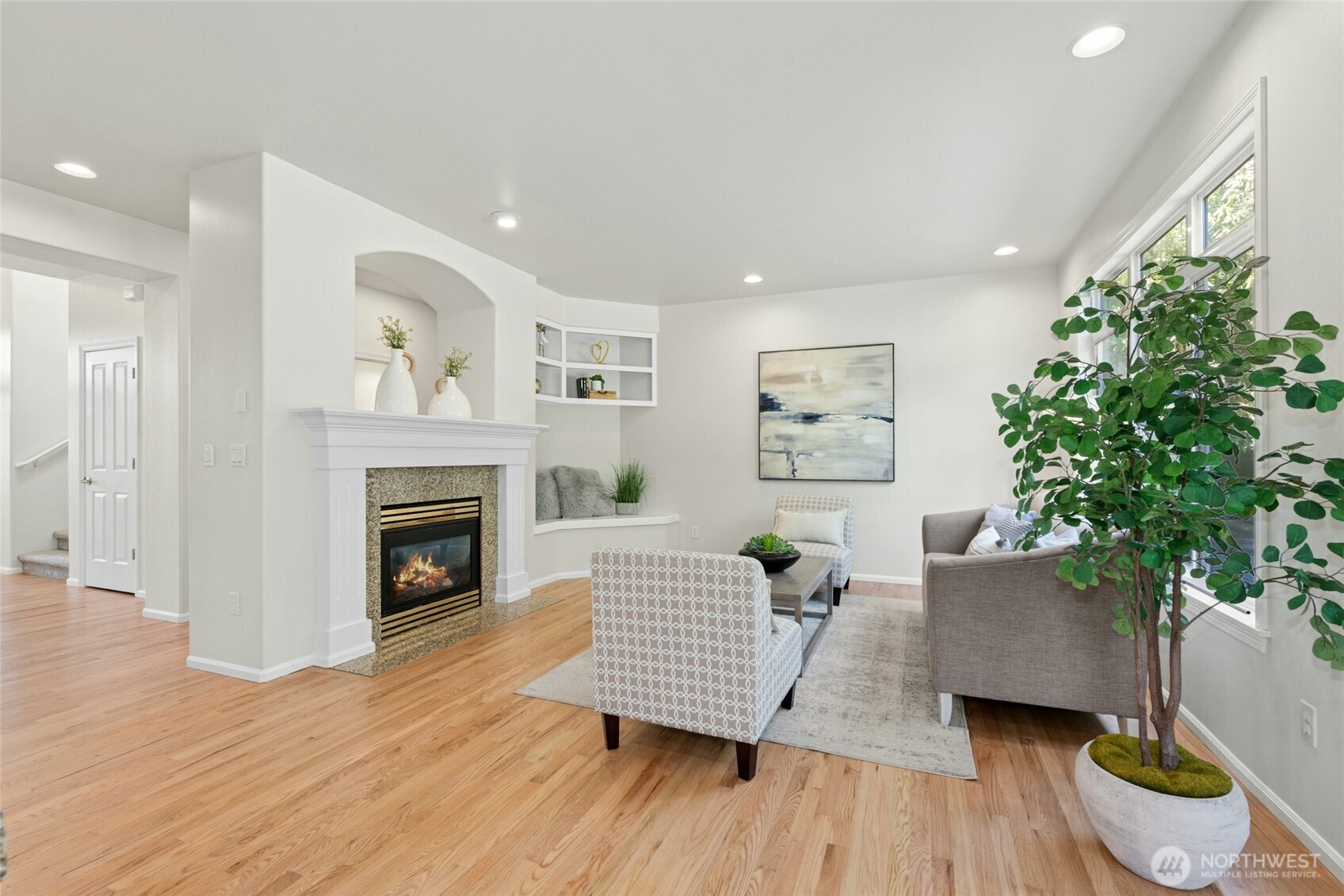 3303 174th Place Southeast Bothell, WA 98012 - Photo 10 of 32 a living room with furniture and a fireplace