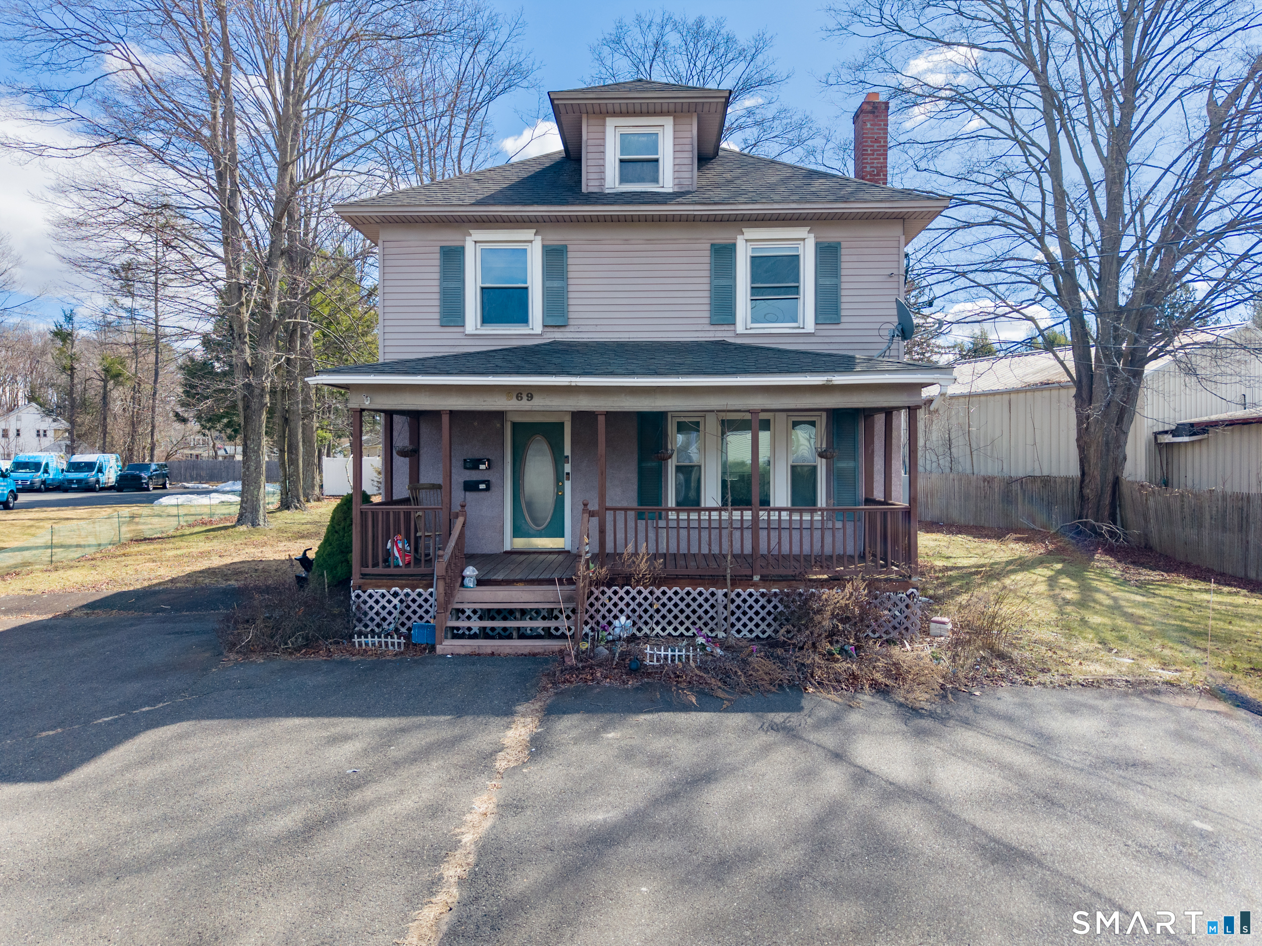 969 South Main Street Southington, CT 06479 - Photo 1 of 1 a front view of a house with garden and porch