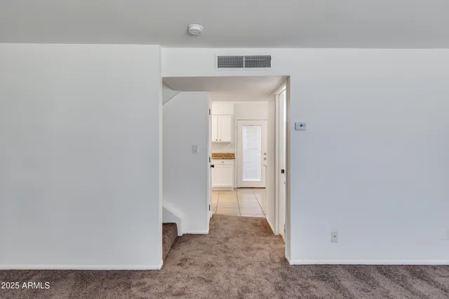 a view of a room with an empty space