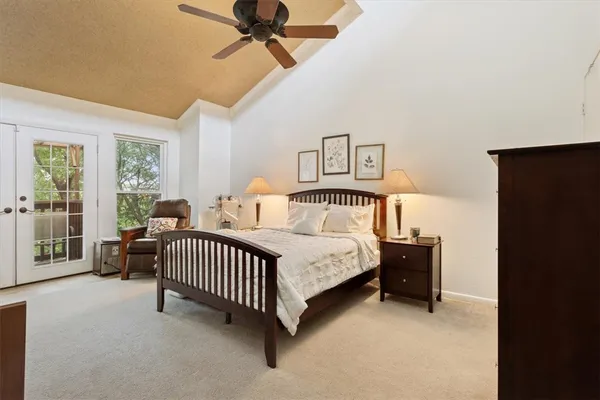 a view of a two chairs in the balcony