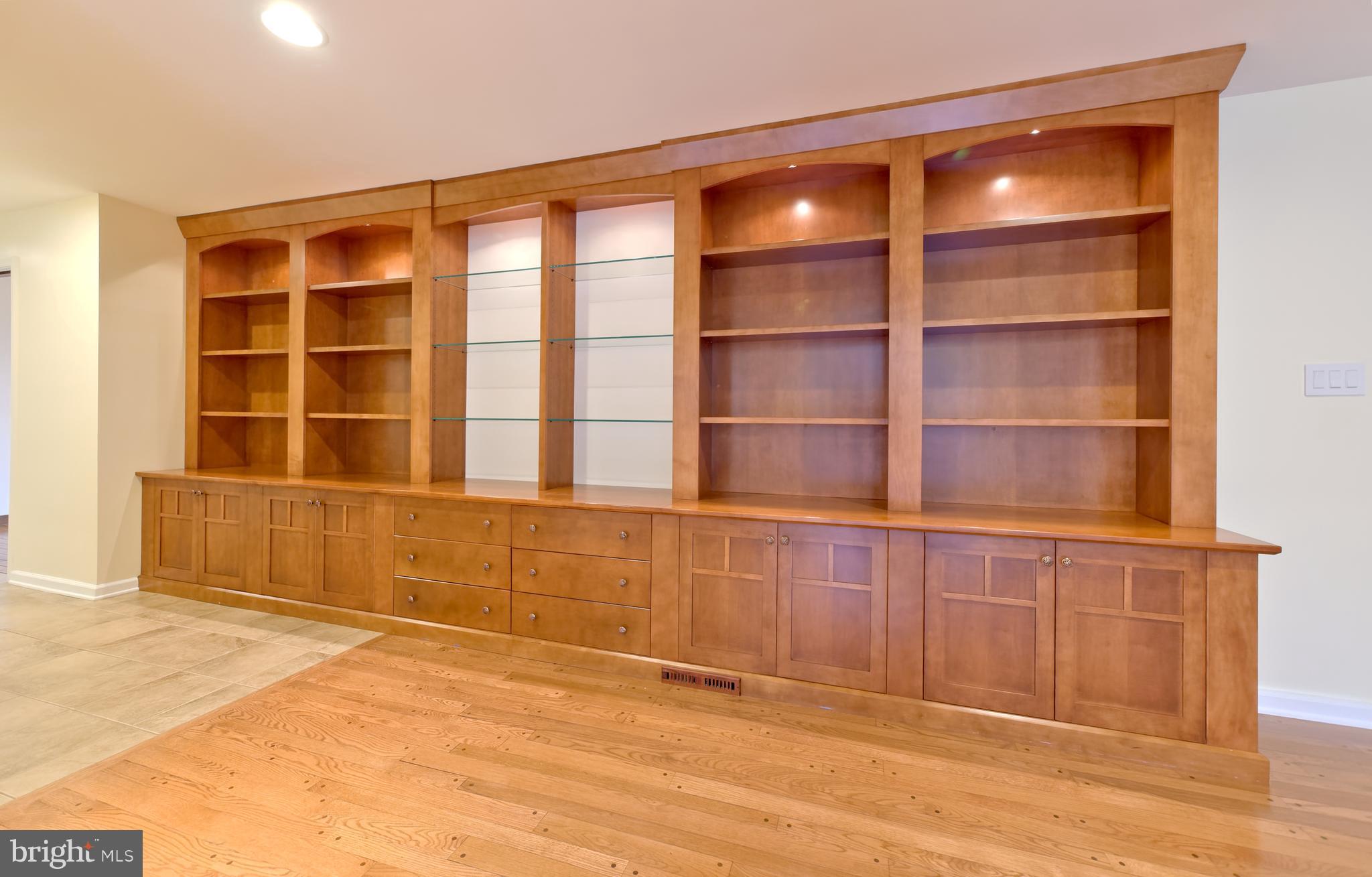 7724 Locust Valley Road Coopersburg, PA 18036 - Photo 11 of 43 Custom bookcase in family room