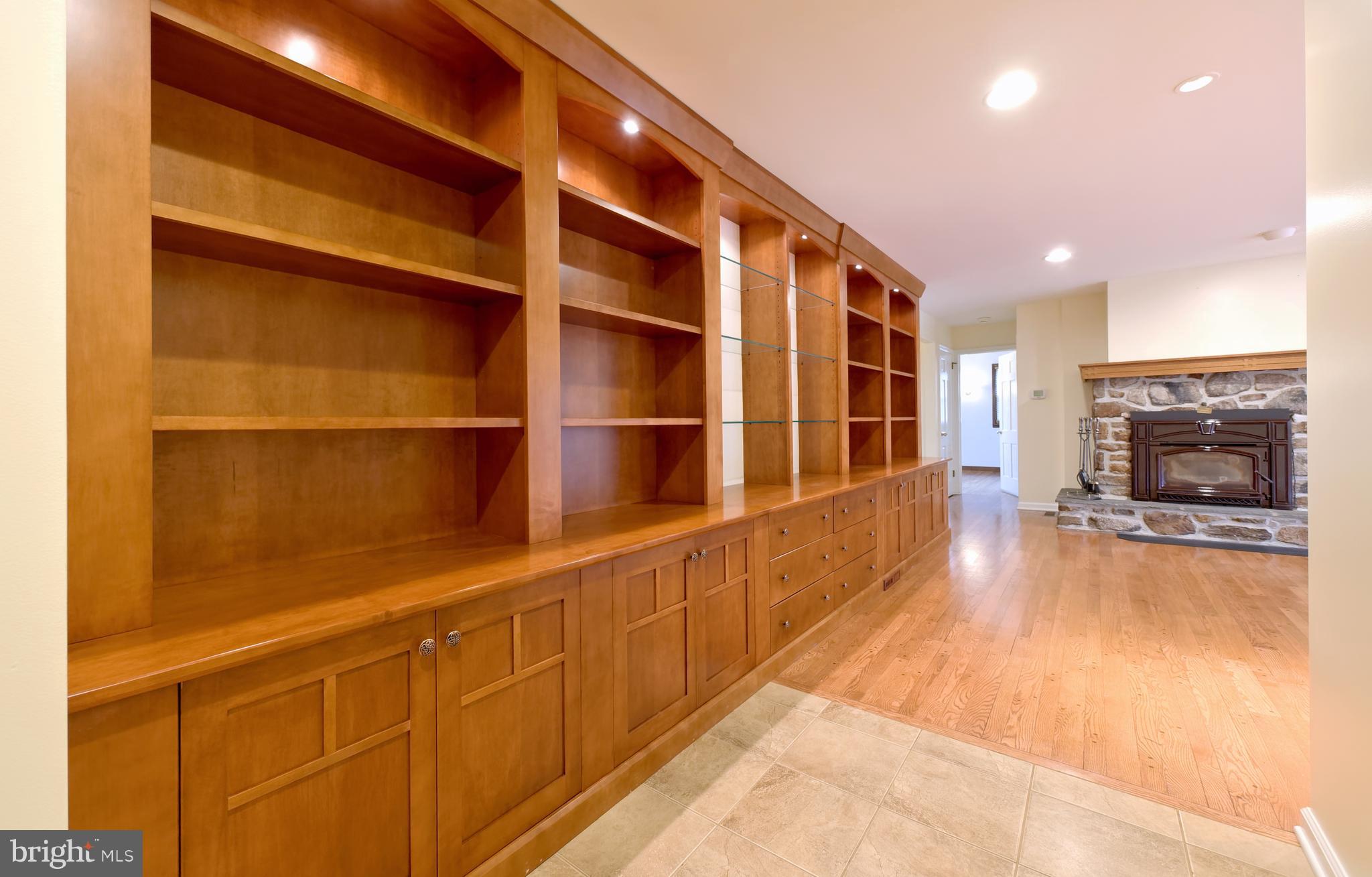 7724 Locust Valley Road Coopersburg, PA 18036 - Photo 12 of 43 Custom bookcase in family room