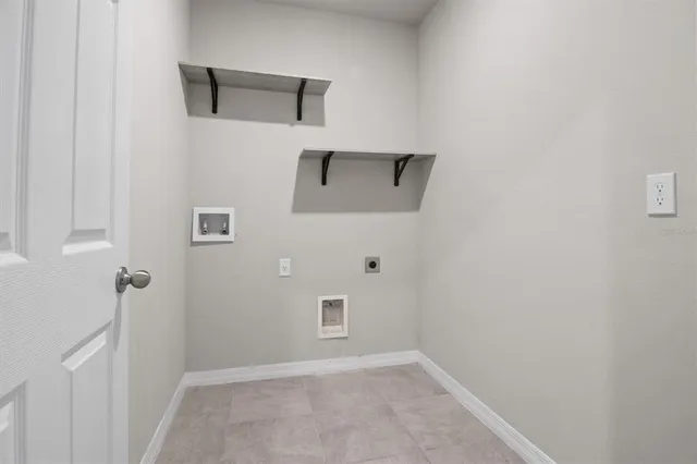 a view of a kitchen with a sink