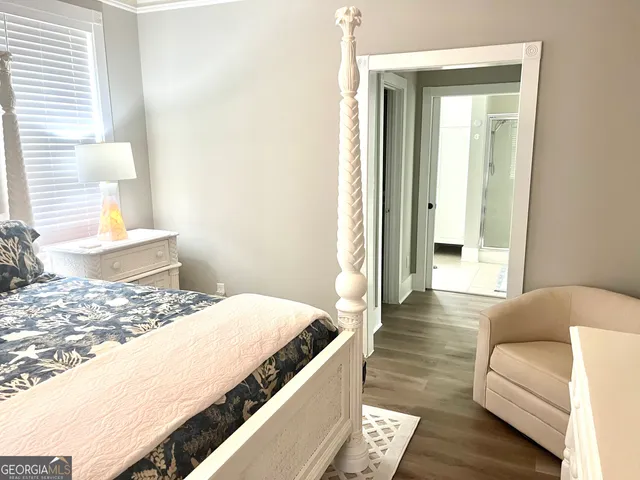 a living room with a bed and a couch