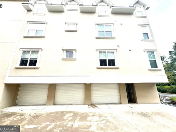 a black white building with glass windows