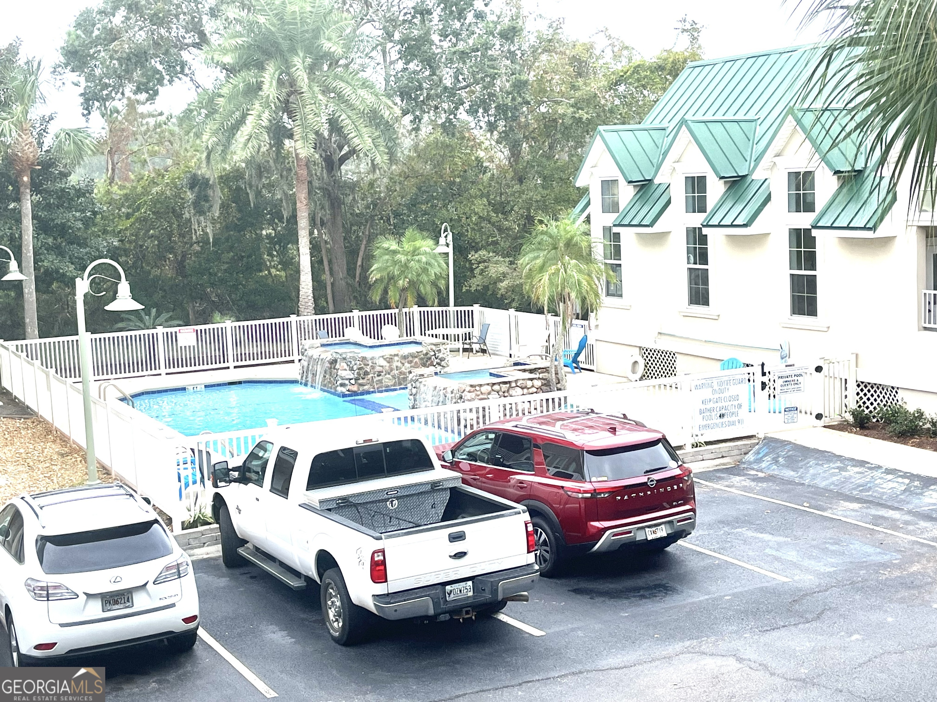 122 Shady Brook Circle, Unit 100 St. Simons, GA 31522 - Photo 31 of 39 a view of outdoor space yard and patio