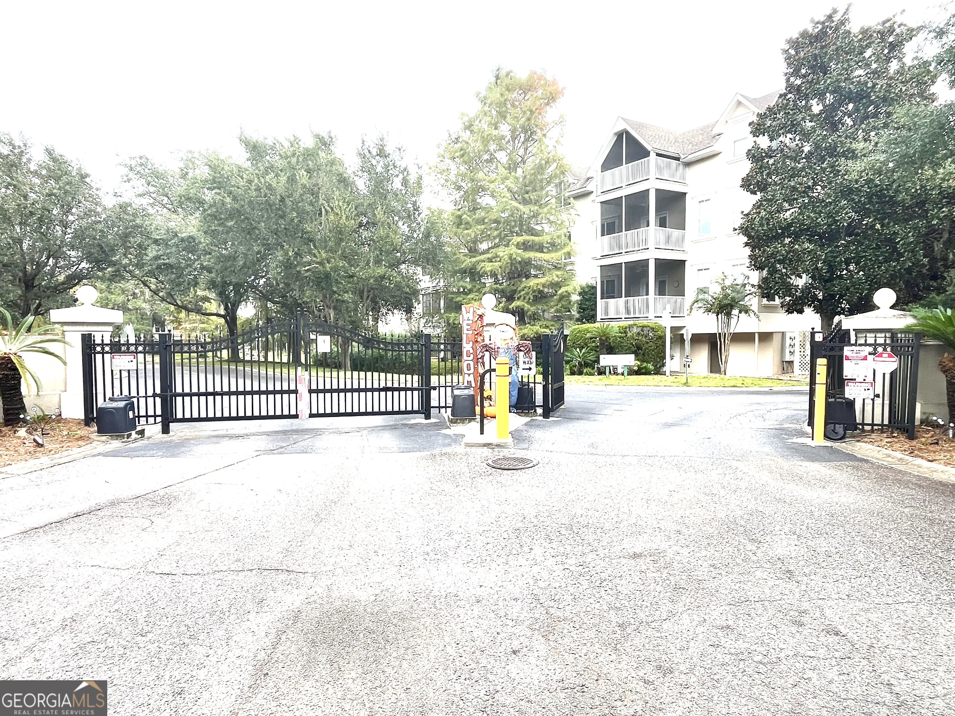 122 Shady Brook Circle, Unit 100 St. Simons, GA 31522 - Photo 39 of 39 a view of a street with a houses