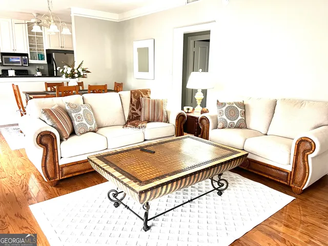 a living room with furniture and a couch