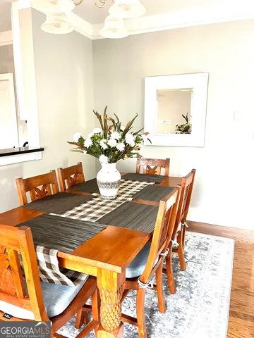a view of a dining room with furniture