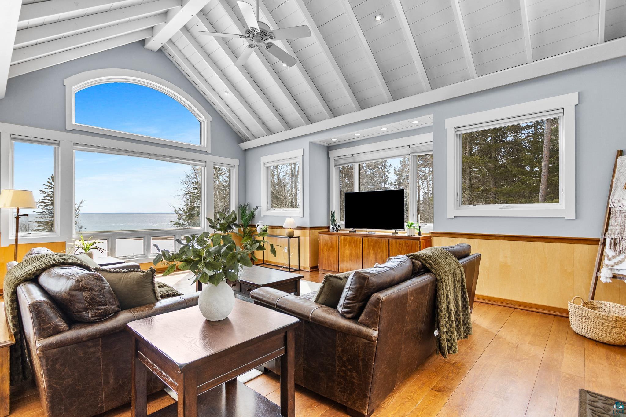 5163 Greenwood Road Duluth, MN 55804 - Photo 6 of 10 Vaulted white plank ceiling with exposed beams