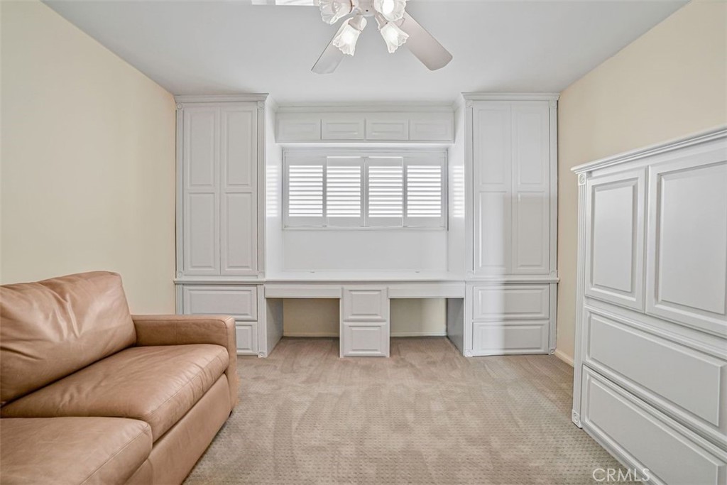615 Esplanade, Unit 407 Redondo Beach, CA 90277 - Photo 21 of 45 a living room with furniture and white walls