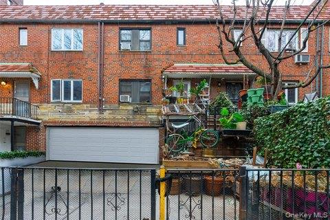 a view of a chairs and table in the patio