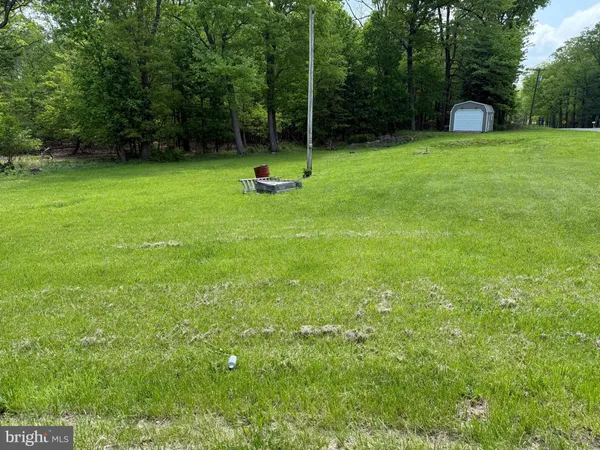 a view of a backyard with a slide