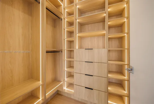 a bathroom with a glass door